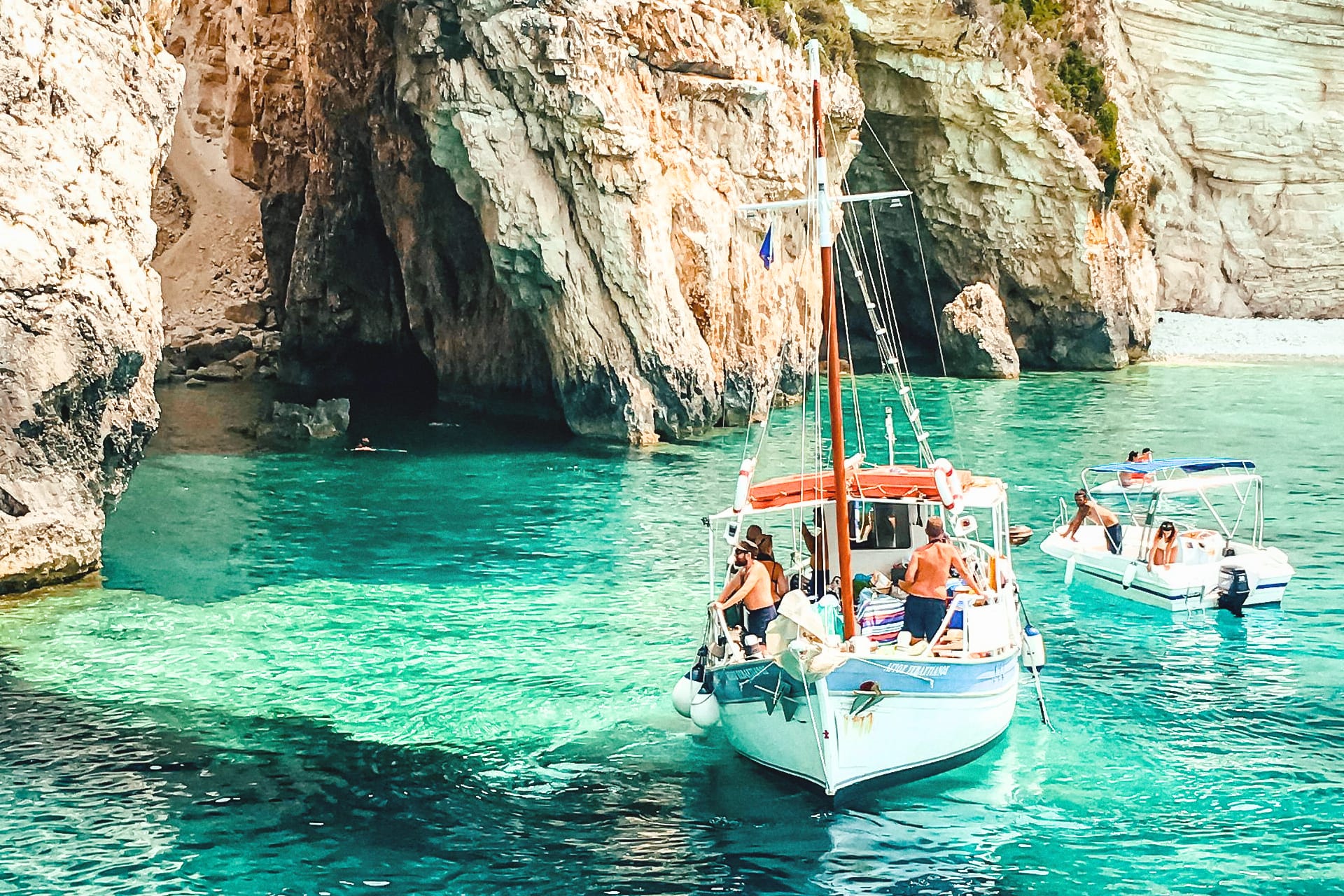 Exploring the Blue Caves of Paxos on a sailing boat